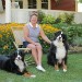 Portrait Session image of Lisa with her two Burmees Mountain Dogs.
